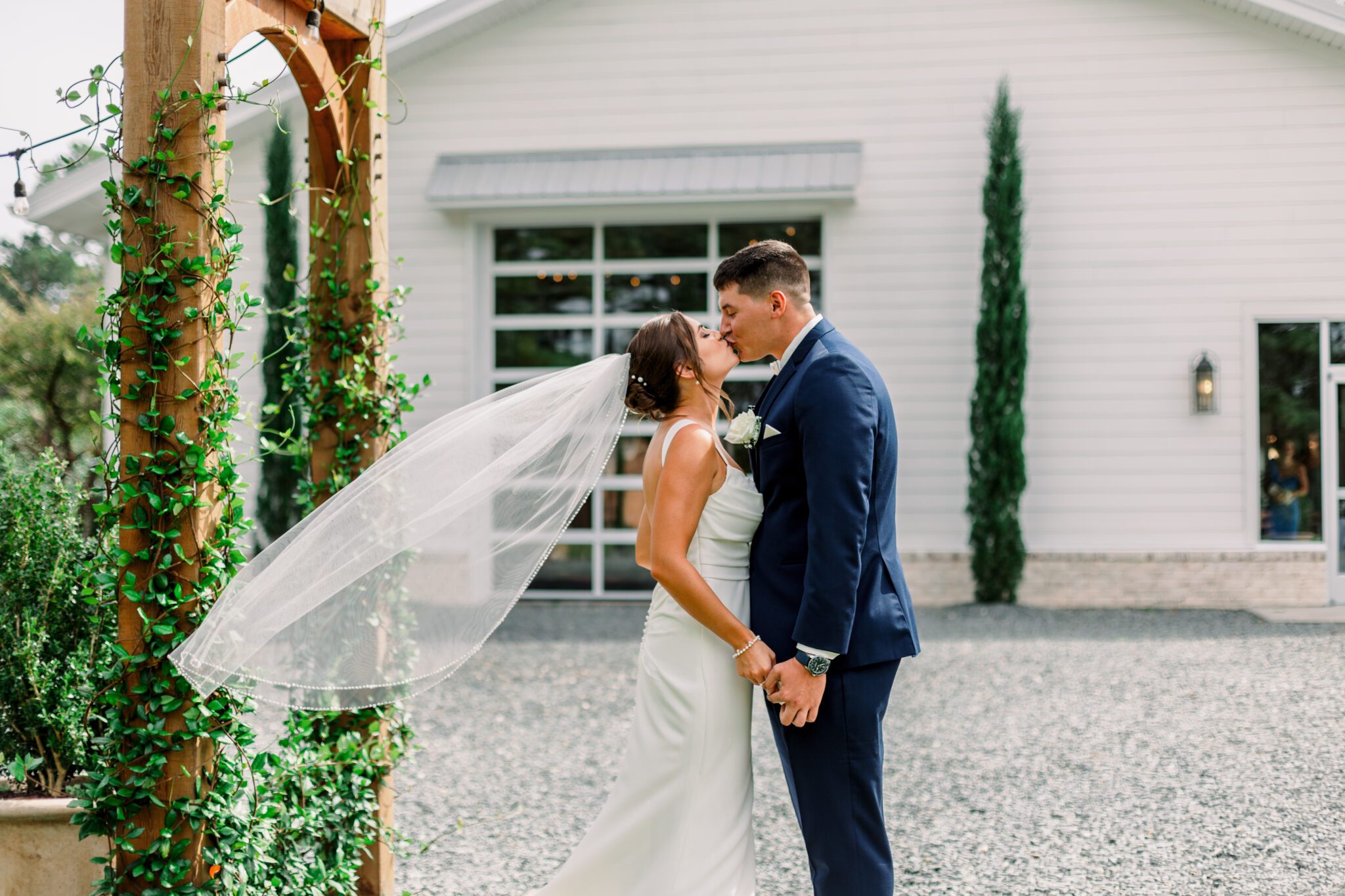 wedding kiss white veil