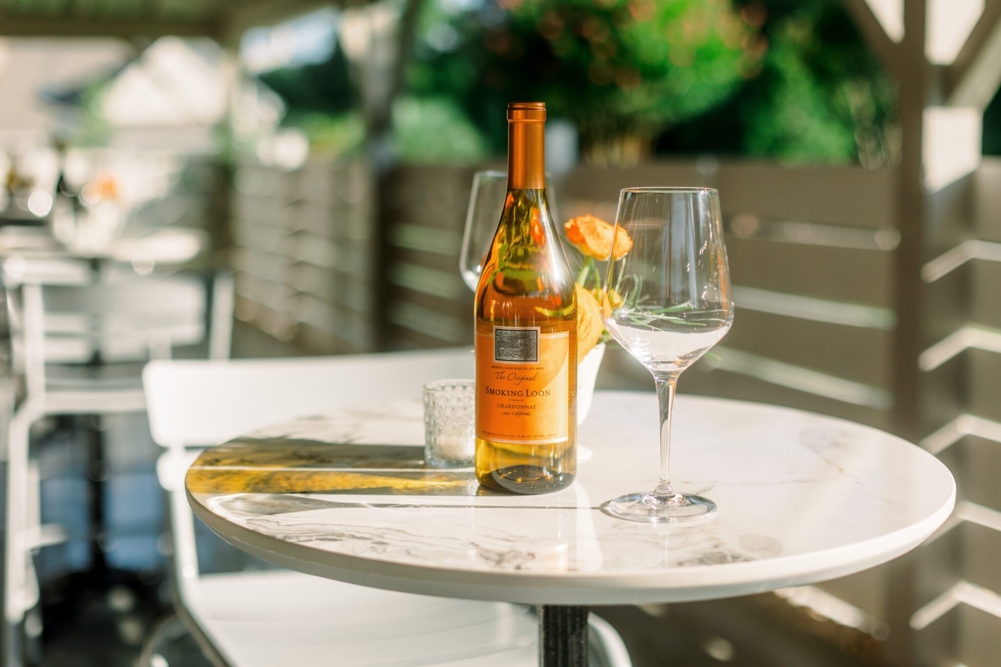 wine glass and wine bottle outdoor patio bistro