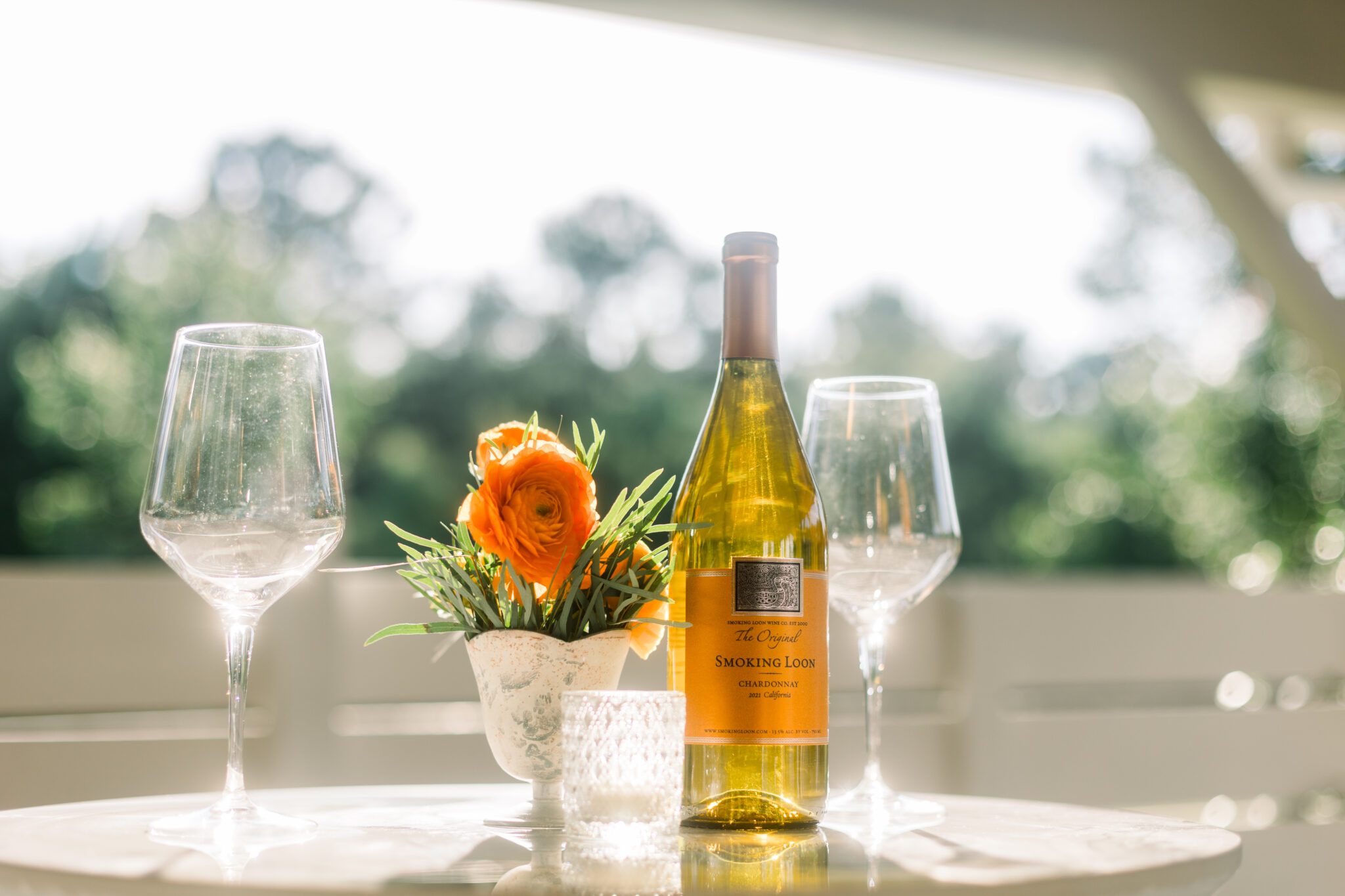 wine glass bottle of wine bistro table