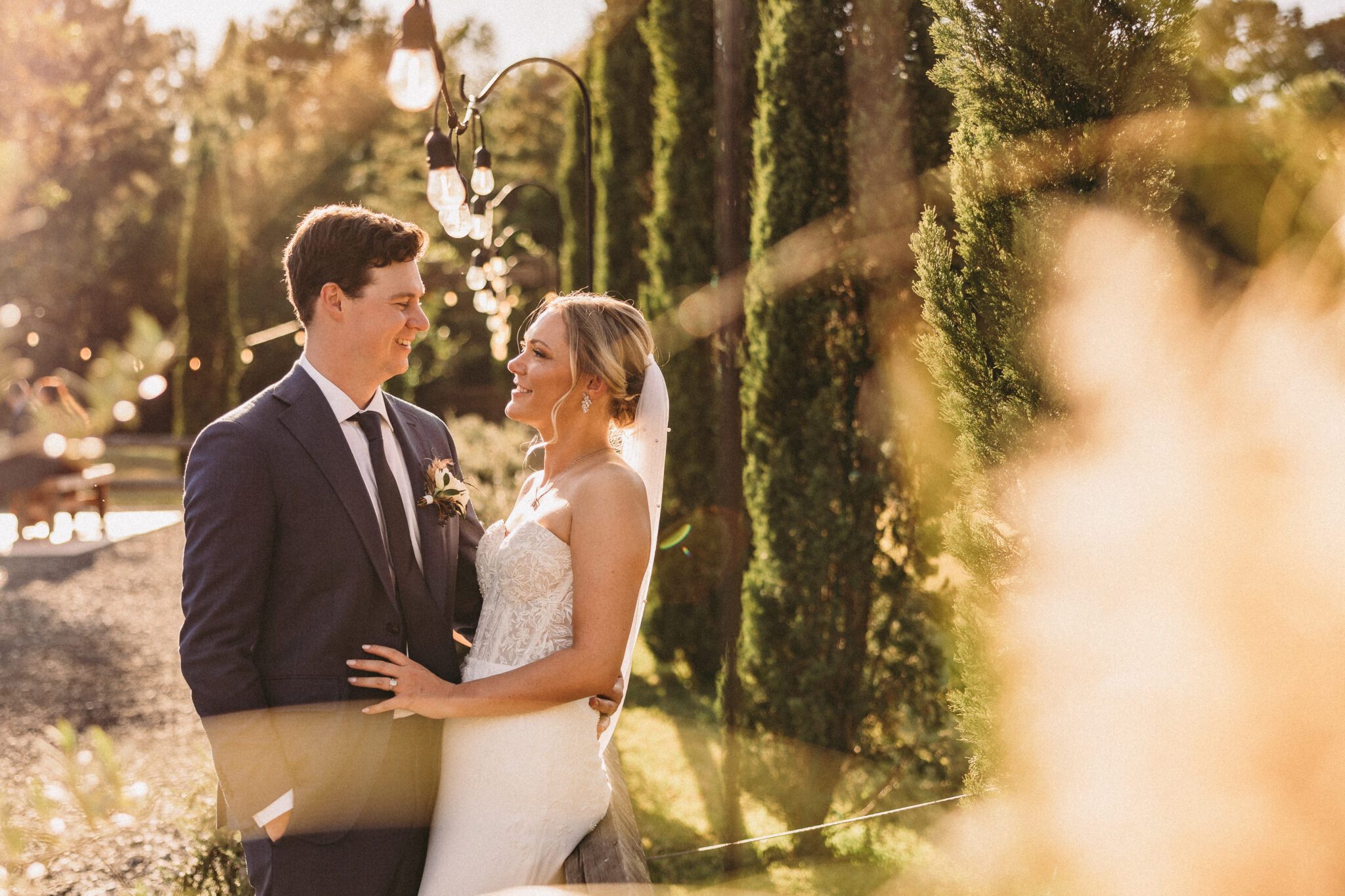 bride and groom wedding Italian cypress trees