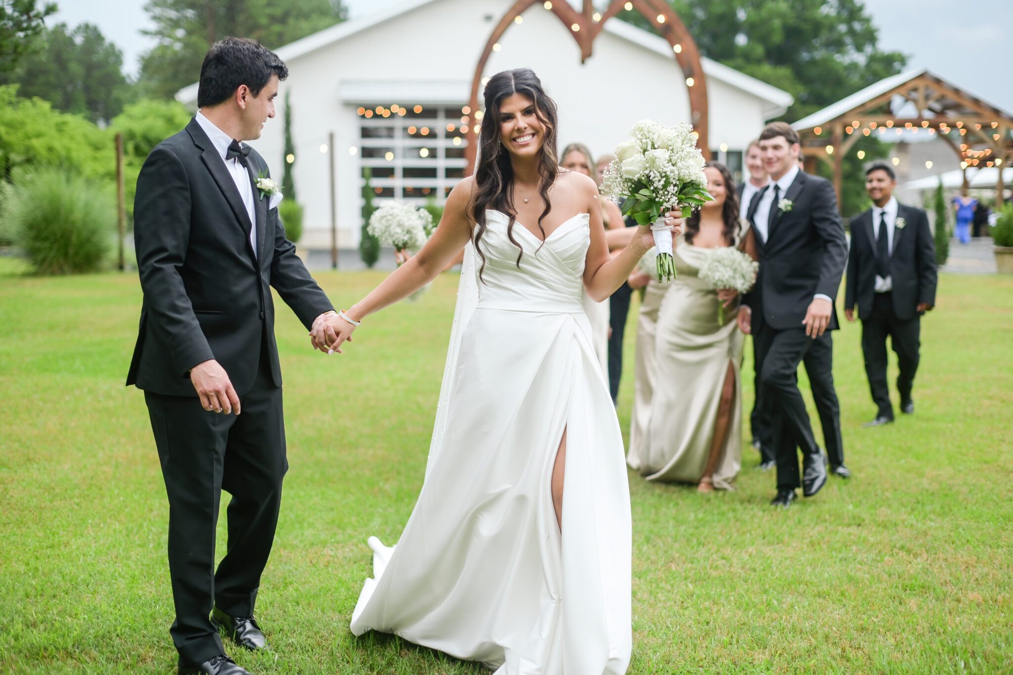 bride in white dress with bouquet