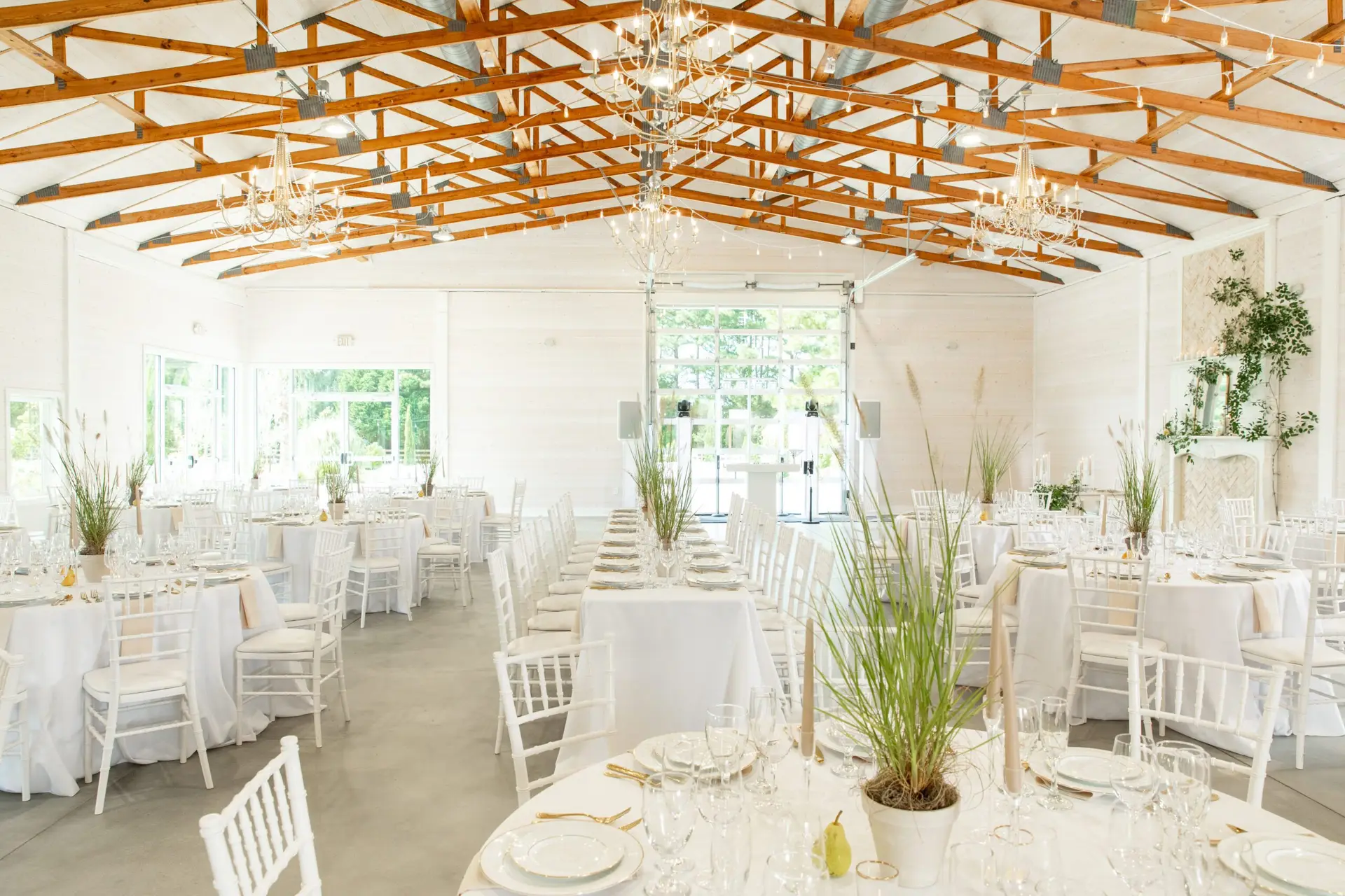Venue Hall set for a wedding reception at Slate & Cypress, a destination wedding venue on the Carolina coast
